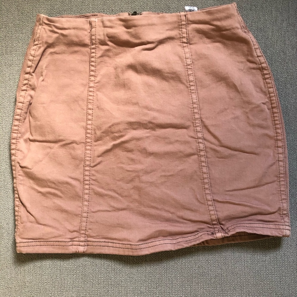 Cute rose colored mini skirt.